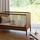 Babybett Ashi - Chestnut 140x70cm (inkl. Umbaumöglichkeit in ein Kinderbett 140x70cm) - little something